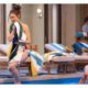 Drew Cain emerging from pool as Willow Tait watches on General Hospital
